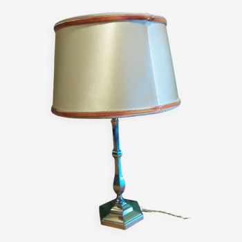 Silver metal lamp with its lampshade