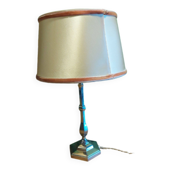 Silver metal lamp with its lampshade