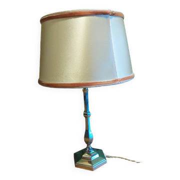 Silver metal lamp with its lampshade