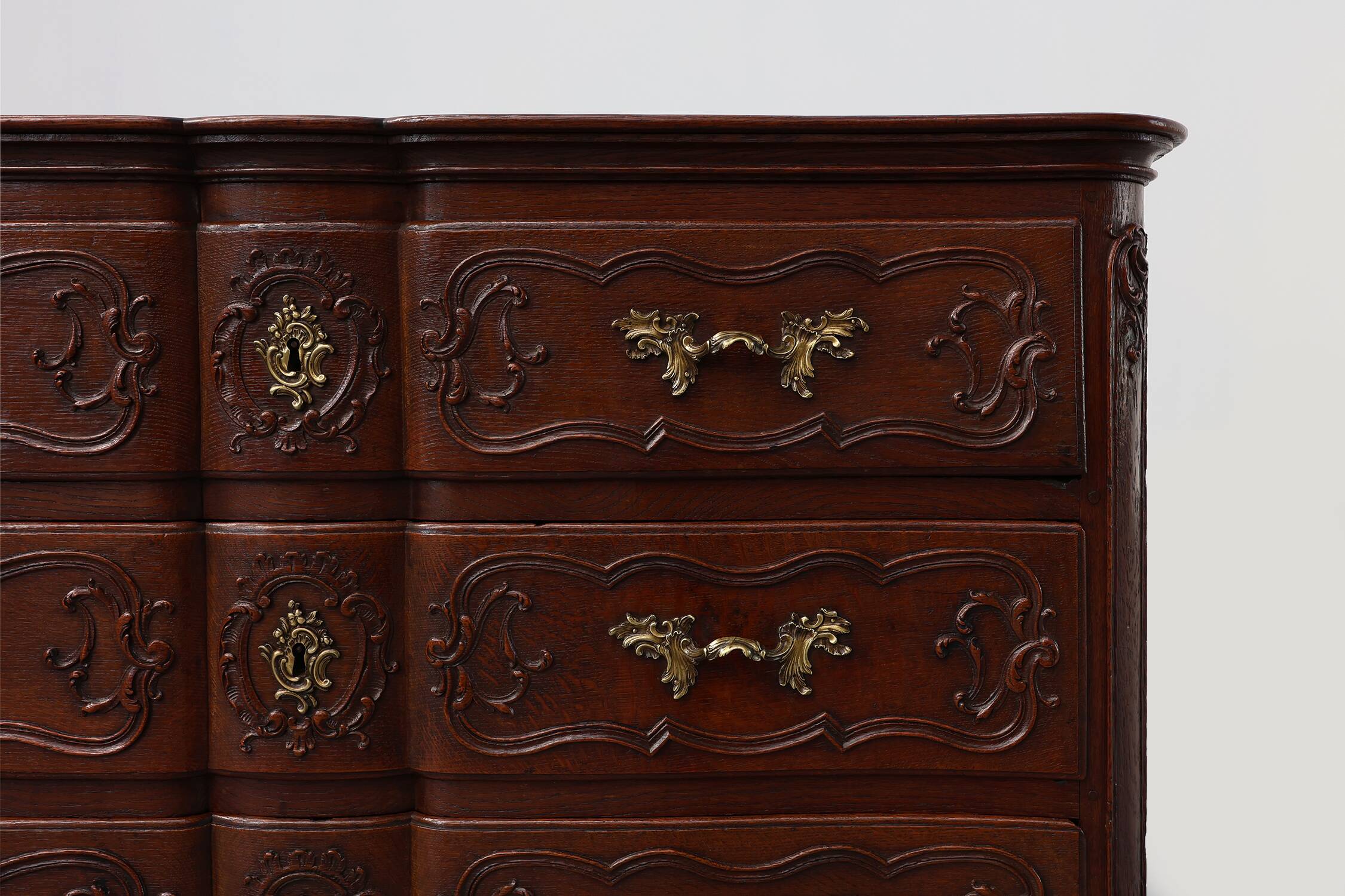 French 18th Century hand crafted oak chest of drawers in Louis XV style