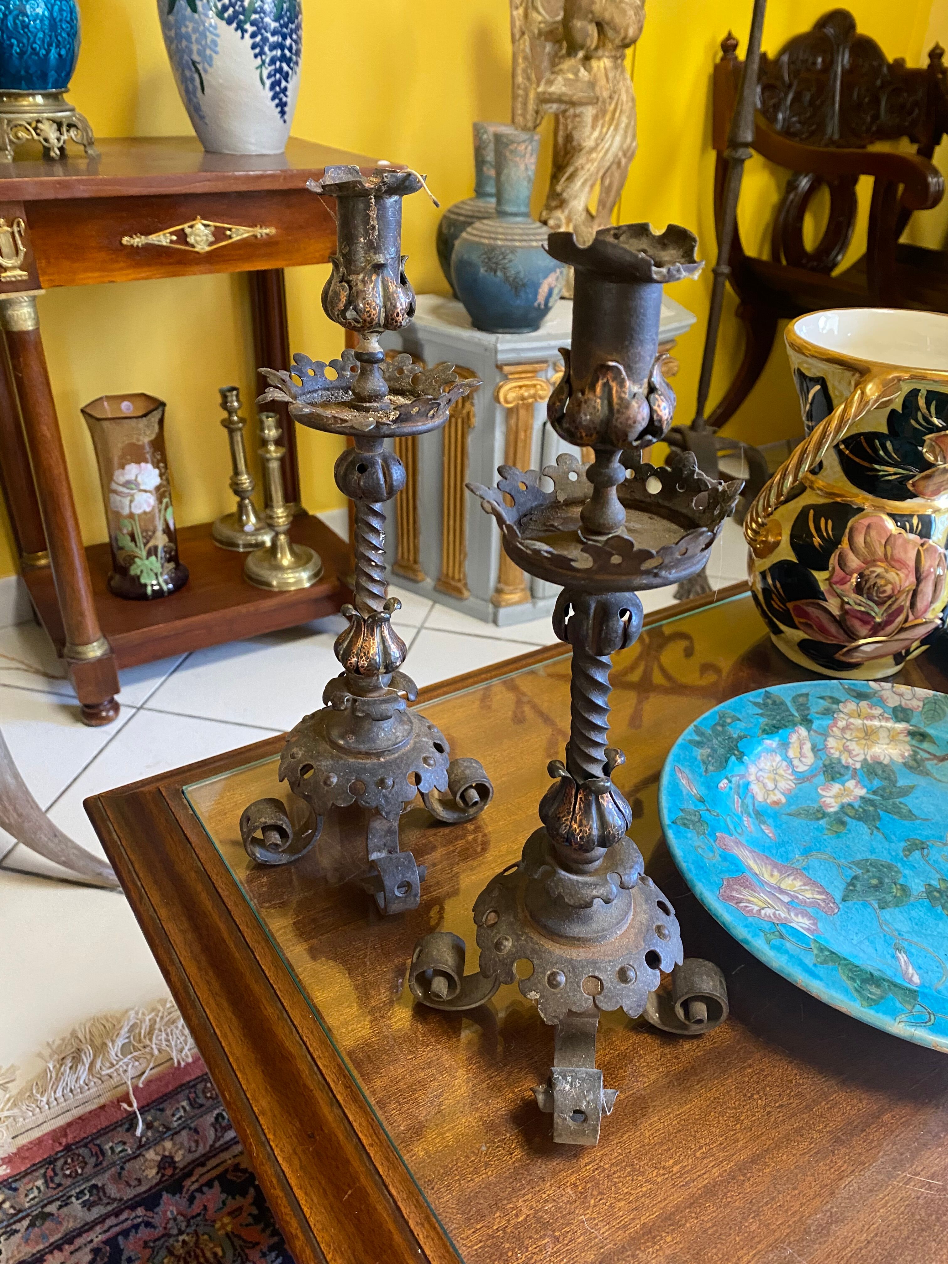 Pair of neo-gothic metal candle holders