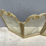 Antique brass fireplace screen from 1920, vintage spark guard.