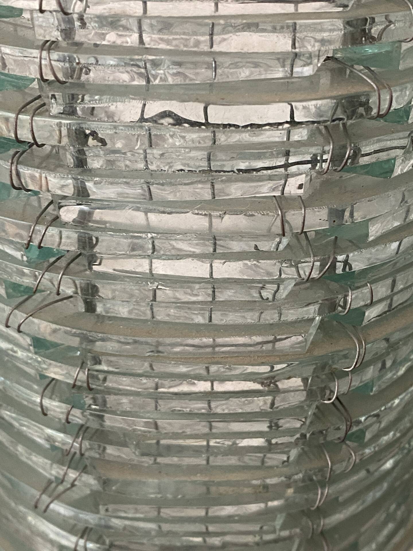 Blue-tinted glass lamp and wire.