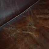 English style sheepskin leather wingback chair in a cognac color
