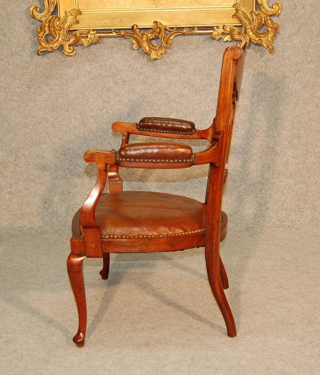19th century armchair in leather and rosewood inlaid with brass and rosewood