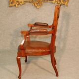 19th century armchair in leather and rosewood inlaid with brass and rosewood