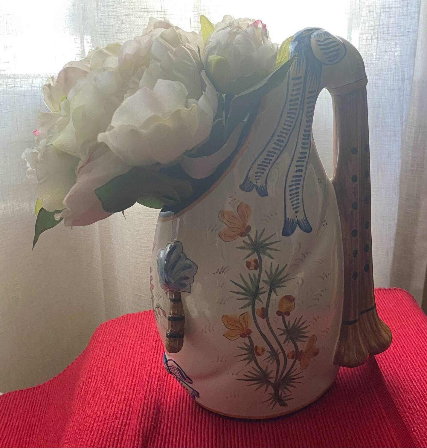 Quimper vase in the shape of a bagpipe, signed and numbered.