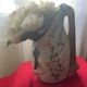 Quimper vase in the shape of a bagpipe, signed and numbered.
