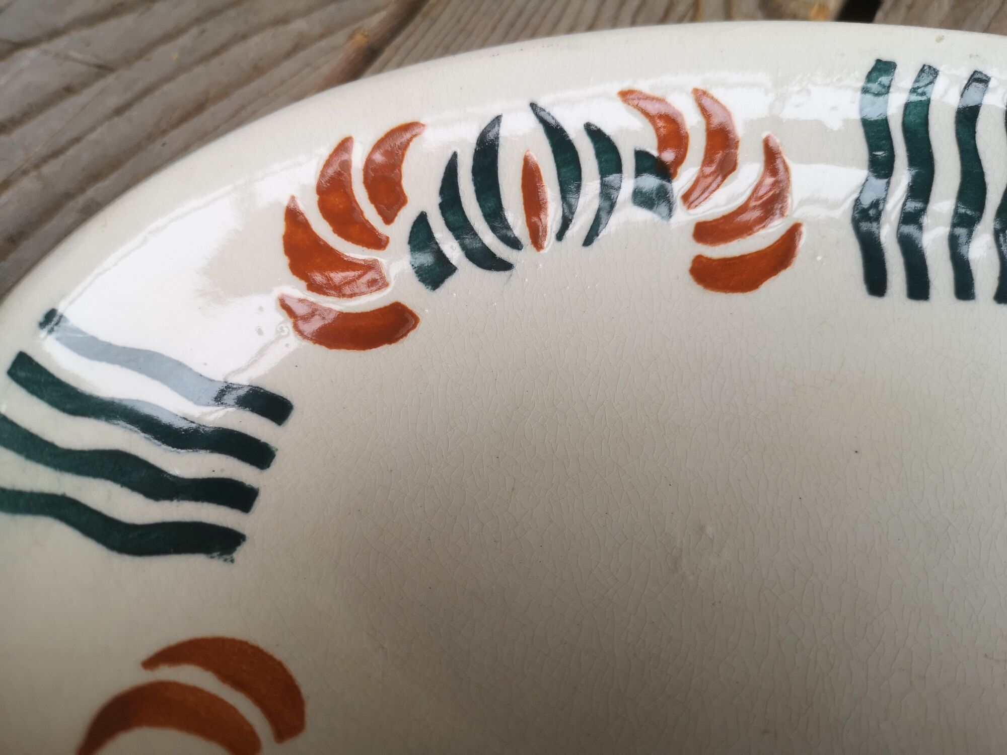 Dish out of ceramics decor orange and green