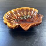 Valauris shell pocket emptier