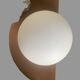 opaline ball wall light with ceramic/terracotta surround