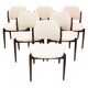 Set of six hardwood chairs by Arne Vodder for Sibast with white textile upholstery.