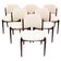 Set of six hardwood chairs by Arne Vodder for Sibast with white textile upholstery.