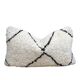 Bohemian wool pillow cover on a Beni Ourain Berber cushion. The cushion cover