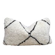 Bohemian wool pillow cover on a Beni Ourain Berber cushion. The cushion cover
