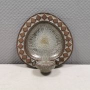 Wall-mounted candlestick in grayish colors, Danish and from the 1970s-80s.