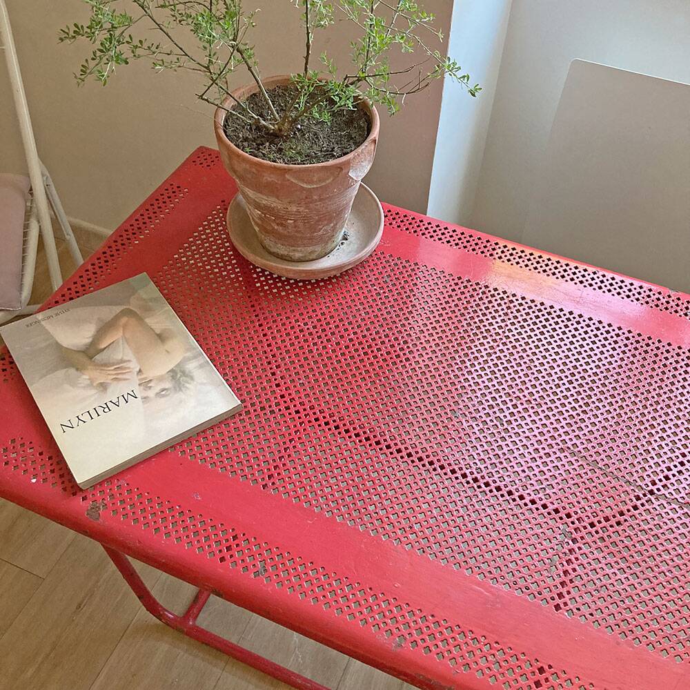Perforated metal coffee table from the 1950s