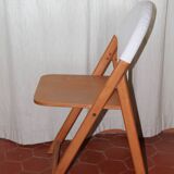 Designer folding chairs in wood and fabric