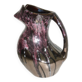 Pitcher in the shape of a stylized bird