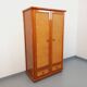 Vintage woven rattan and wood armoire by Maugrion for Roche-Bobois.