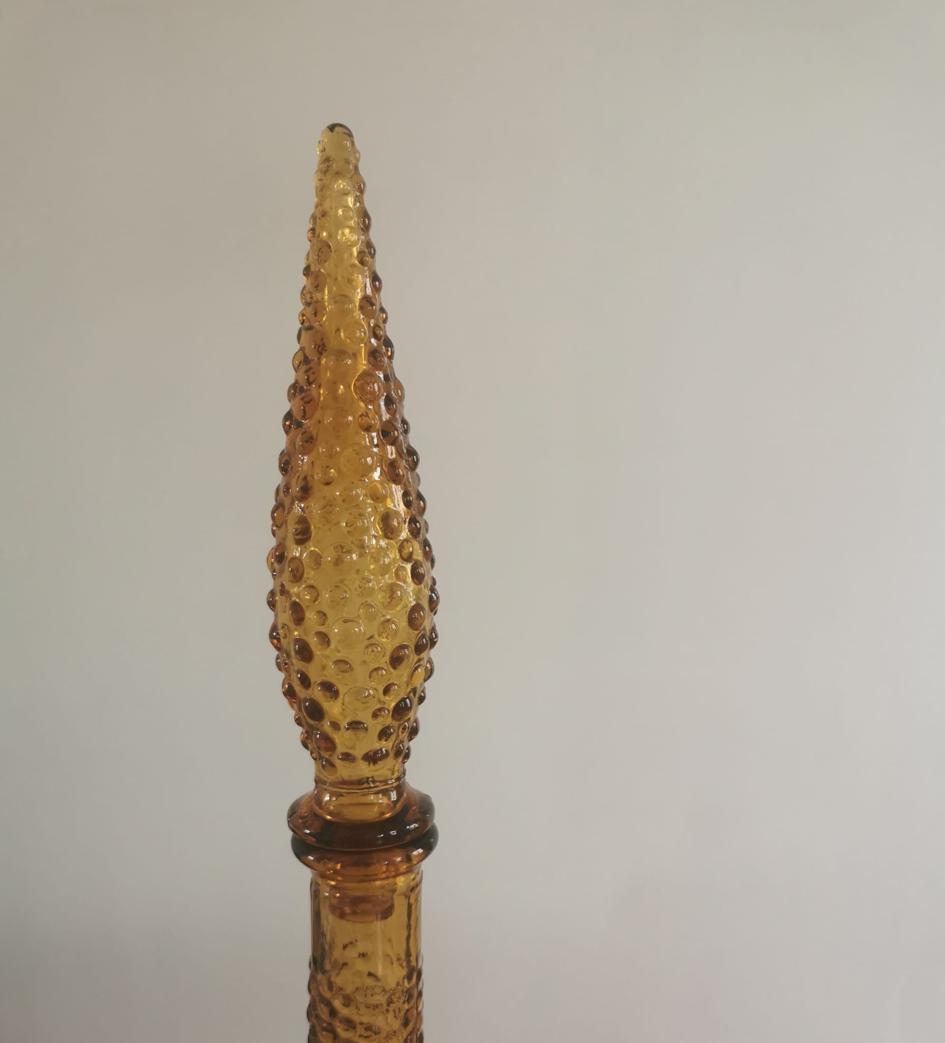 Amber-colored empoli glass decanter