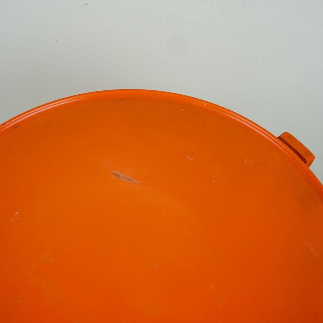 Circular orange Italian Space Age plastic trolley