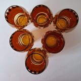 Carafe and its amber/gold glasses from the 70s