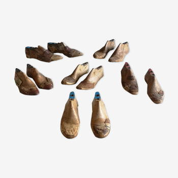 Lot of old shoes, wooden shoe shapes