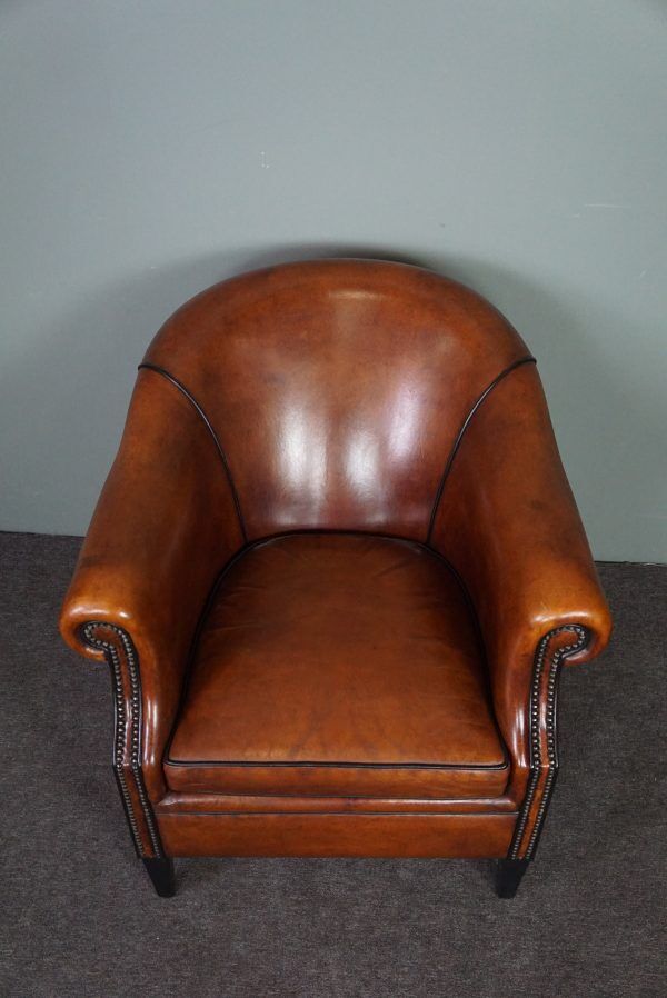 Leather club chair with black piping