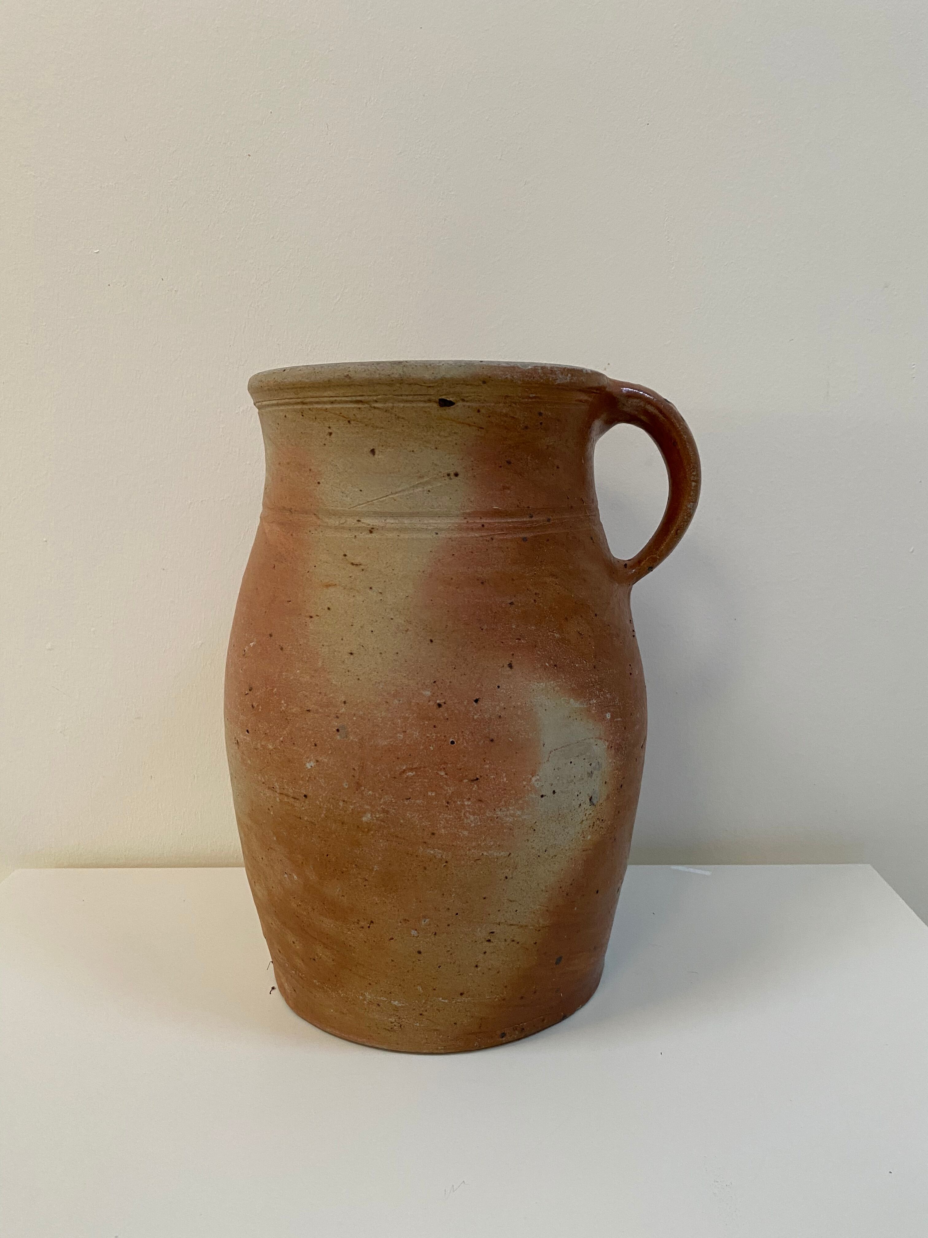Old sandstone pitcher pot