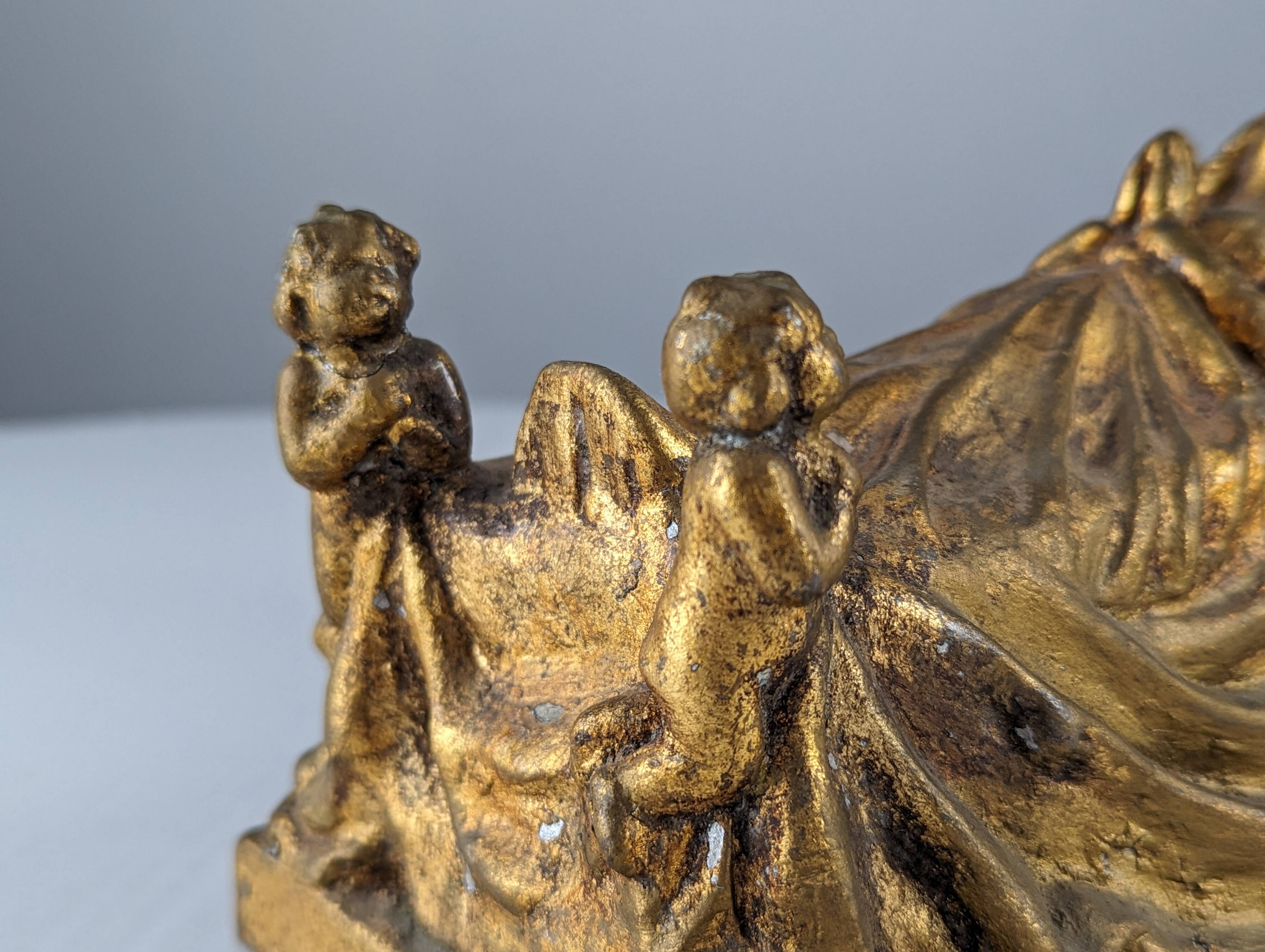Queen and Angels sculpture in golden terracotta