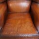 Fauteuil à oreilles en cuir de mouton