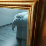 Miroir dans un élégant cadre doré. 84 x 57