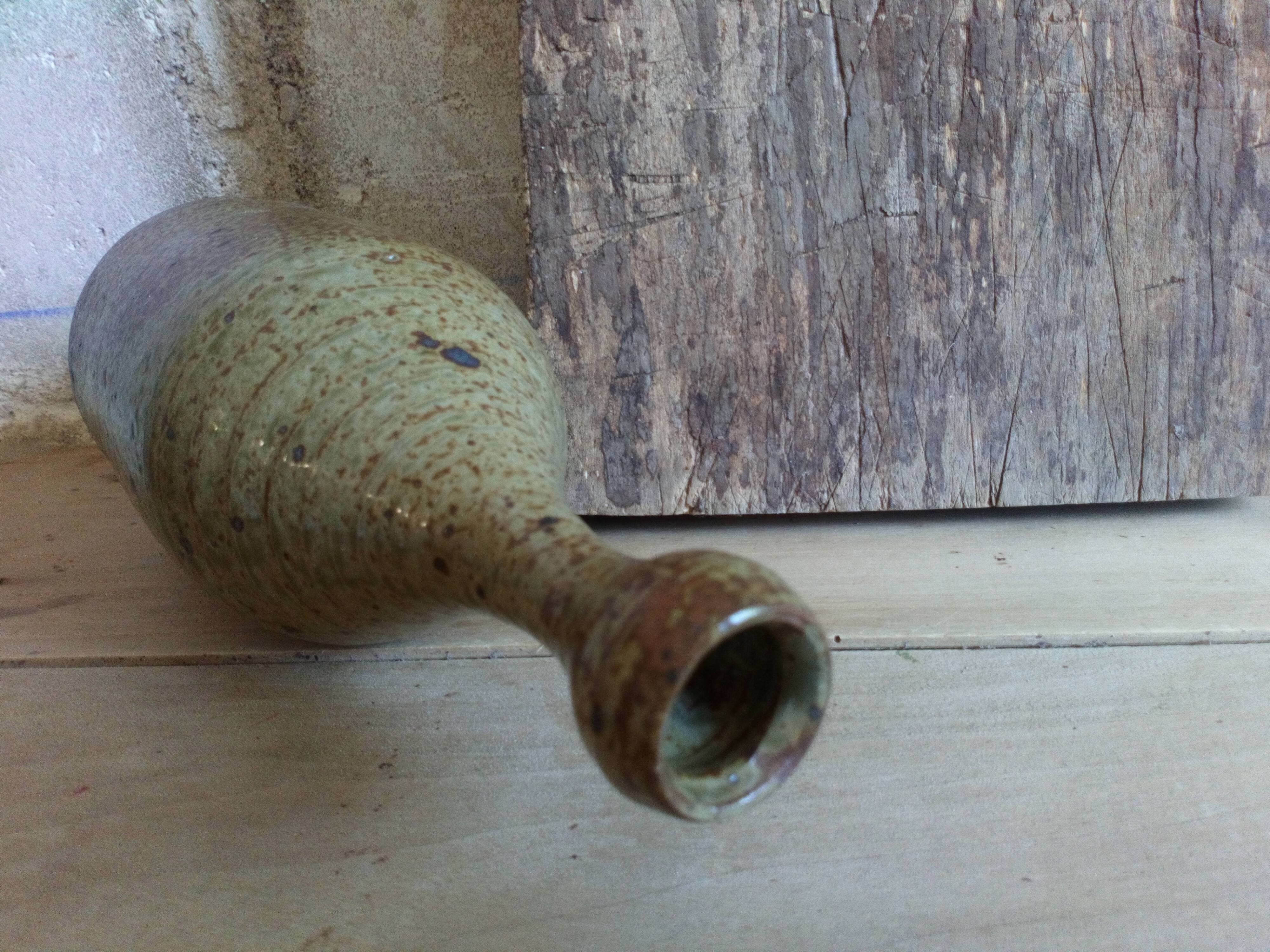 Bottled sandstone vase with a narrow neck