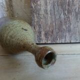 Bottled sandstone vase with a narrow neck