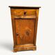 Small rustic antique bedside table made of solid wood.