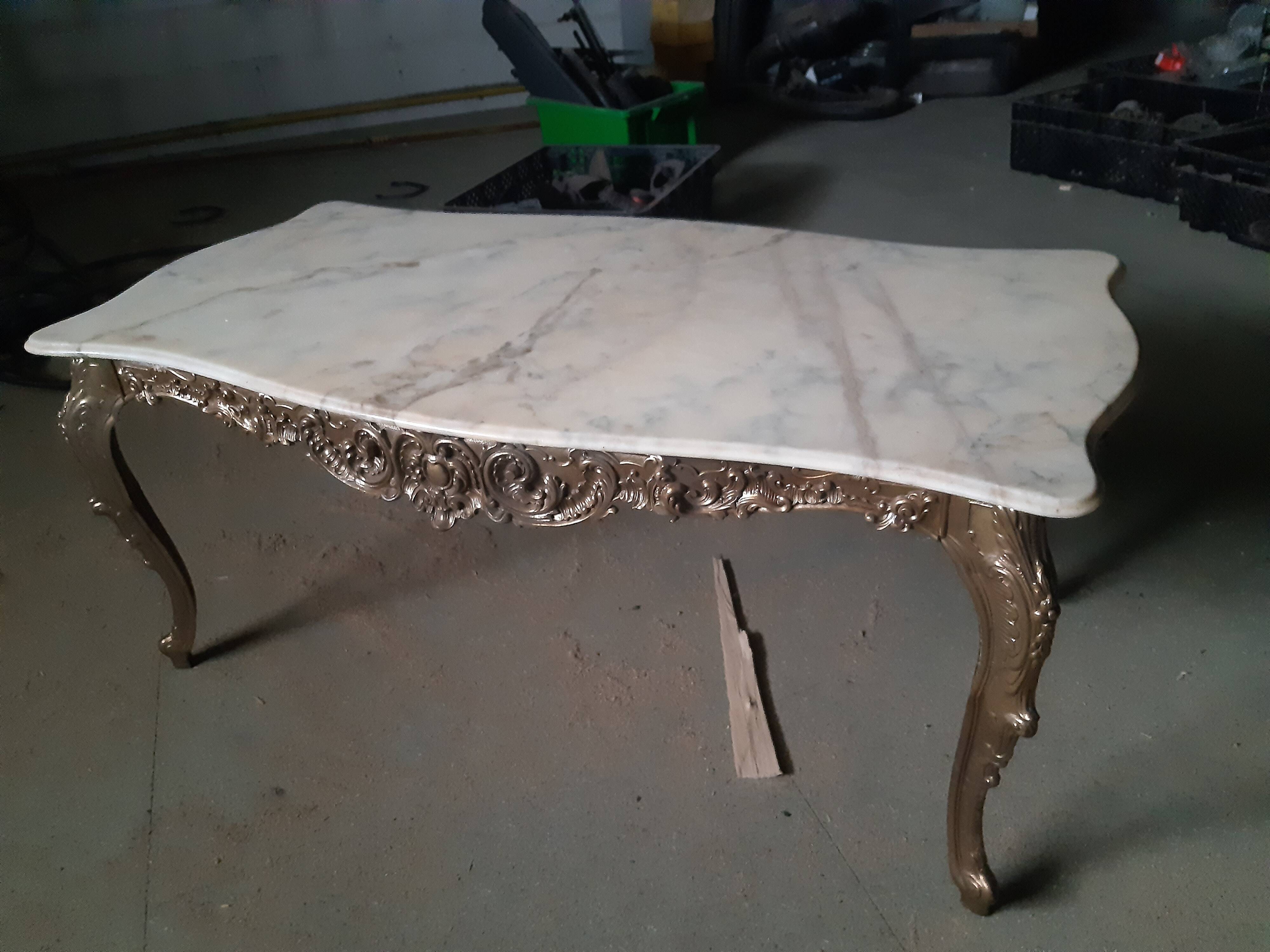 Pedestrian coffee table above marble