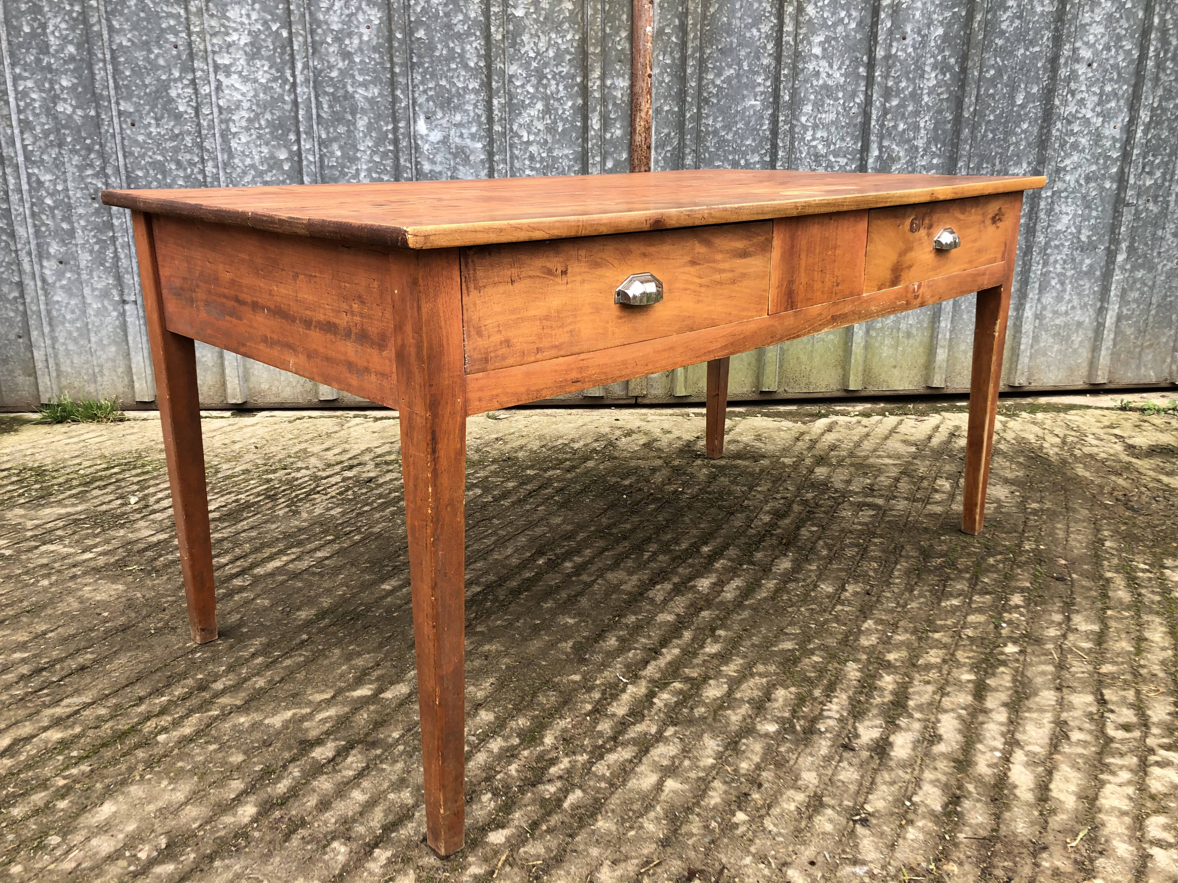 Poplar wood table with 2 front drawers from the Reconstruction period.