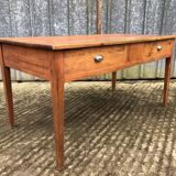 Poplar wood table with 2 front drawers from the Reconstruction period.