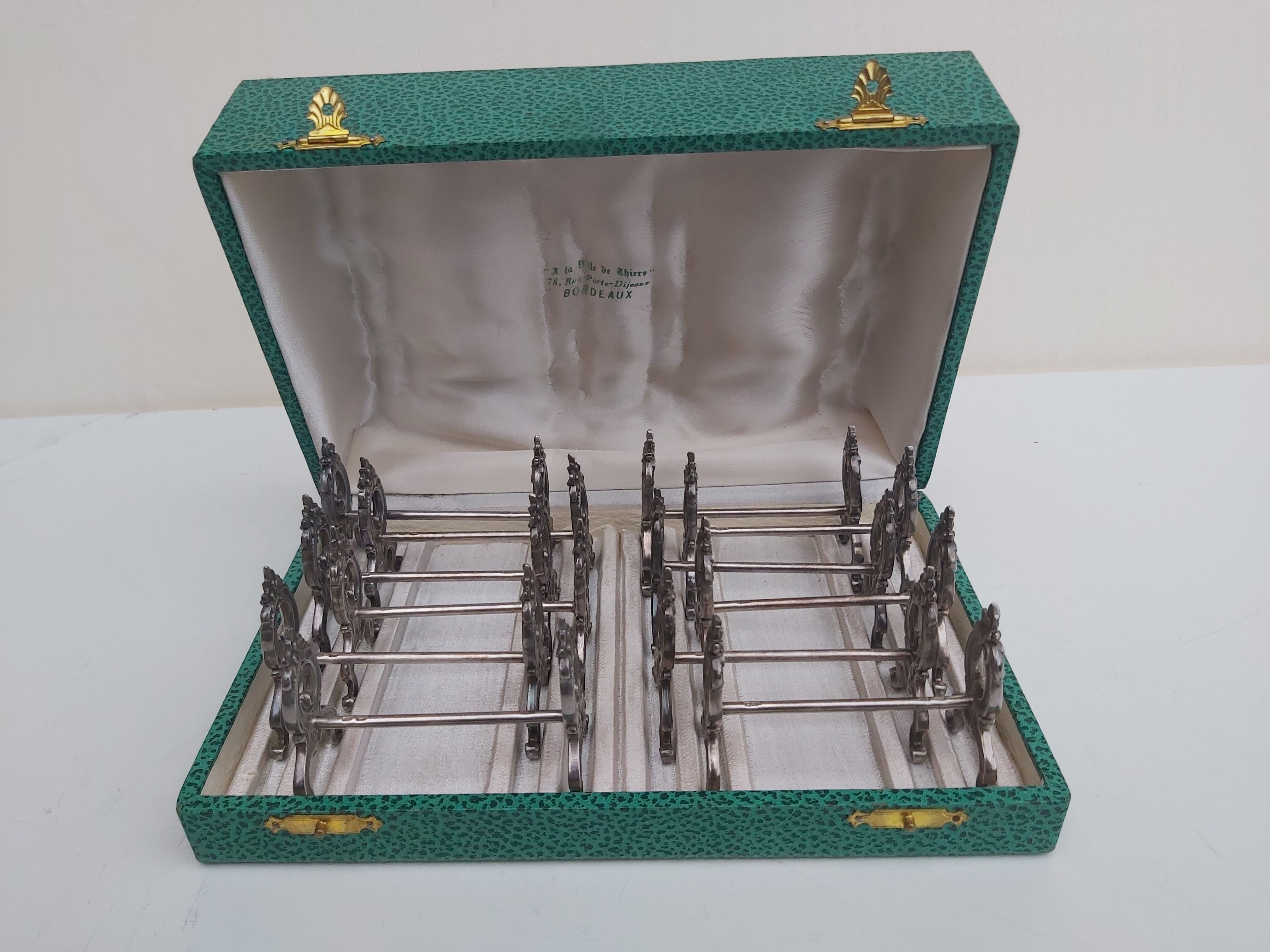 12 knife holders in their SFAM silver metal box