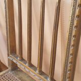 Pair of Louis XVI caned chairs with carved gilded wood.