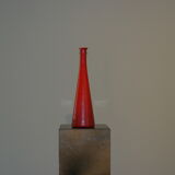 Decorative bottle in red glass