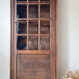 Old glass-fronted library in solid wood