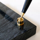 Pen doors on marble base