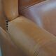 Fauteuil à oreilles en cuir de vache