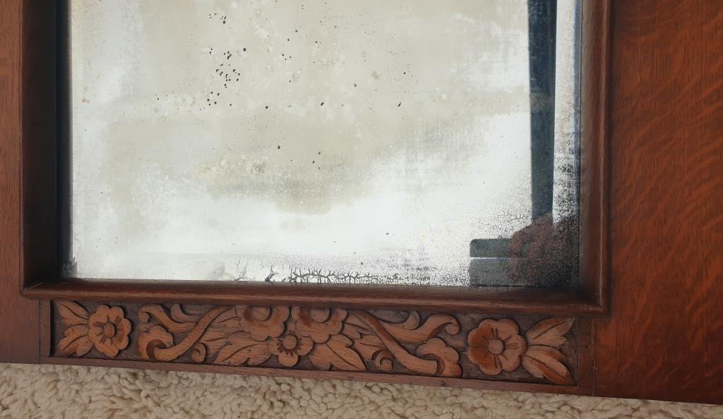 Art Deco door mirror with floral pattern frame