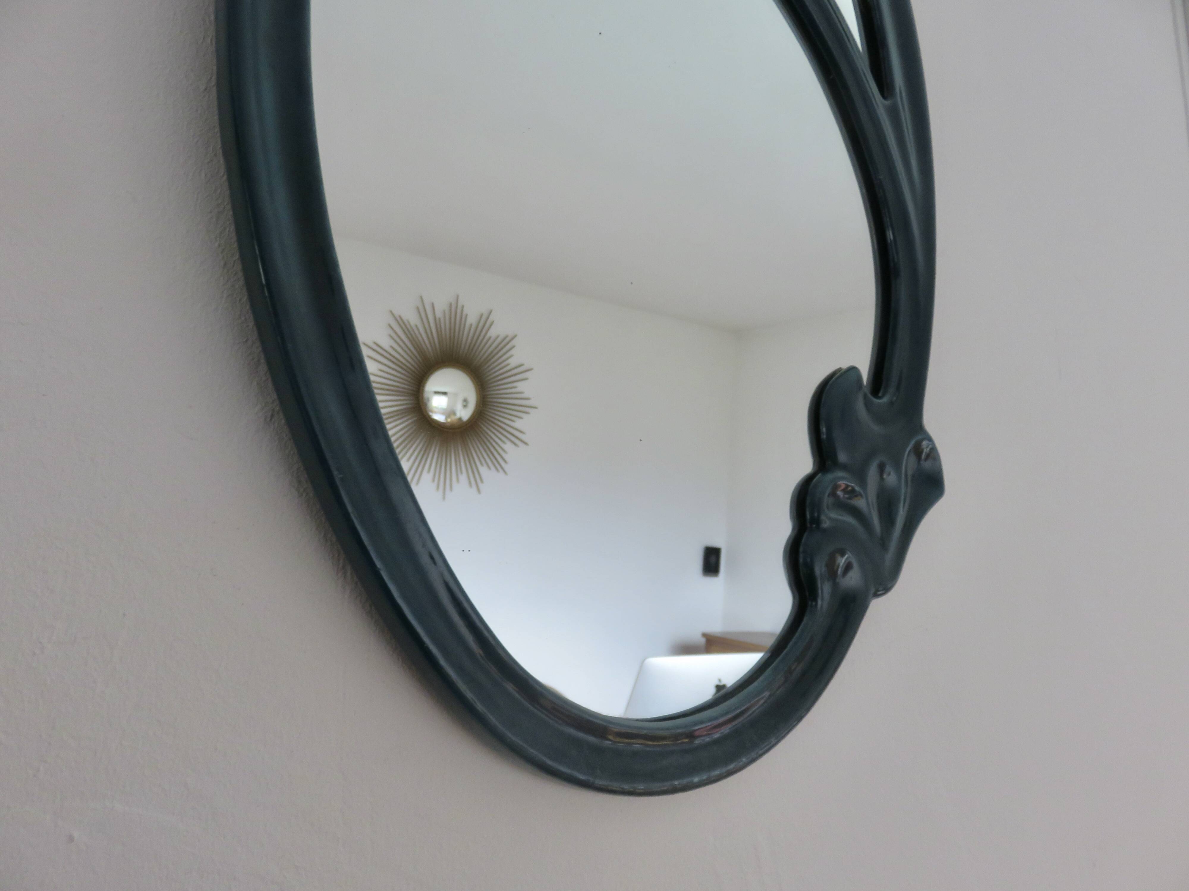 Art Nouveau mirror in blue enamelled cast iron in the style of Hector Guimard.