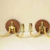 Pair of vintage wall sconces in polished gold brass, wood and glass