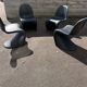 Set of 4 black Verner Panton Vitra chairs.