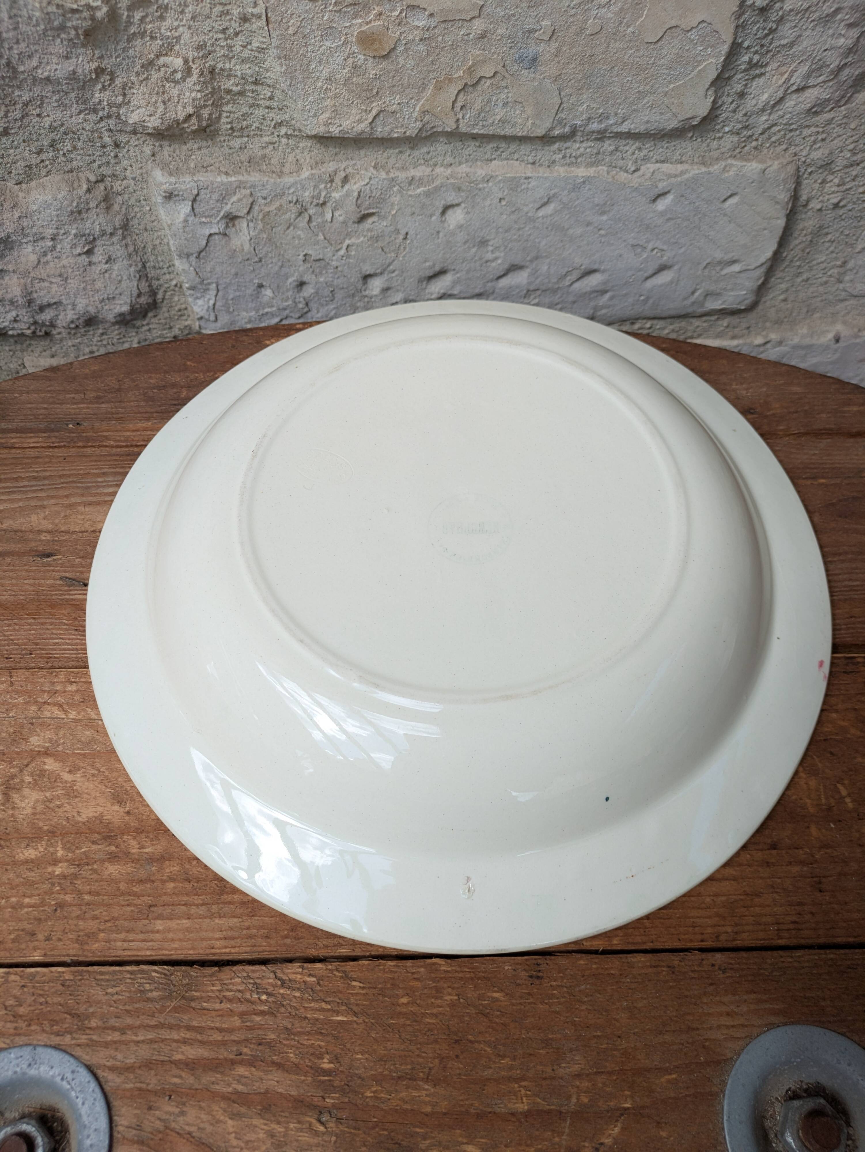 Round hollow serving dish in Salins earthenware model Nénuphar 28.5cm